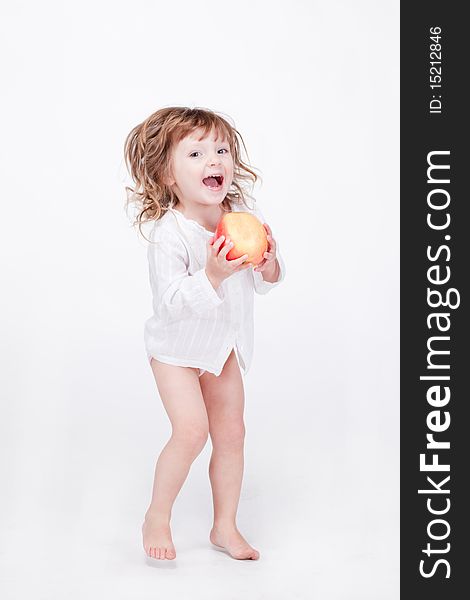 Cute Child Jumping With Apple