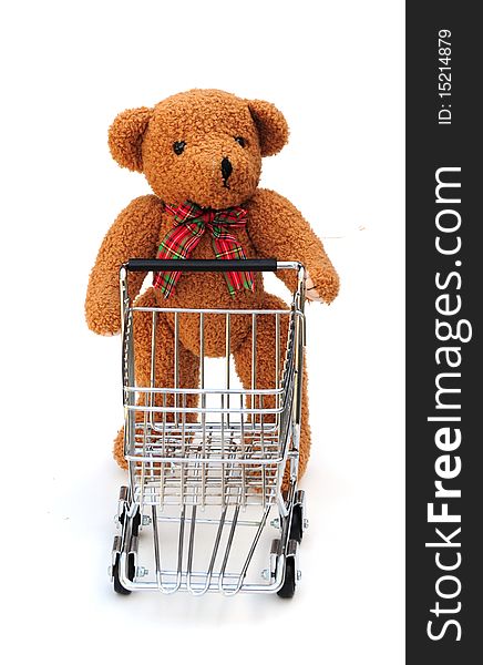Shot of a bear with shopping trolley isolated on white