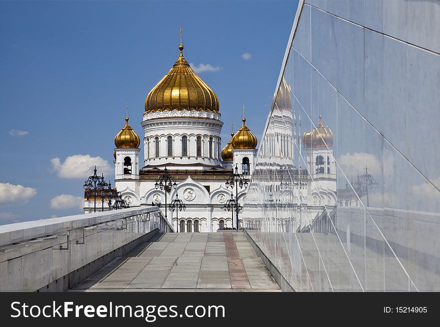 View of Christ the Savior Cathedral and its reflection in marble banister leading to the Patriarchal Bridge, Moscow, Russia