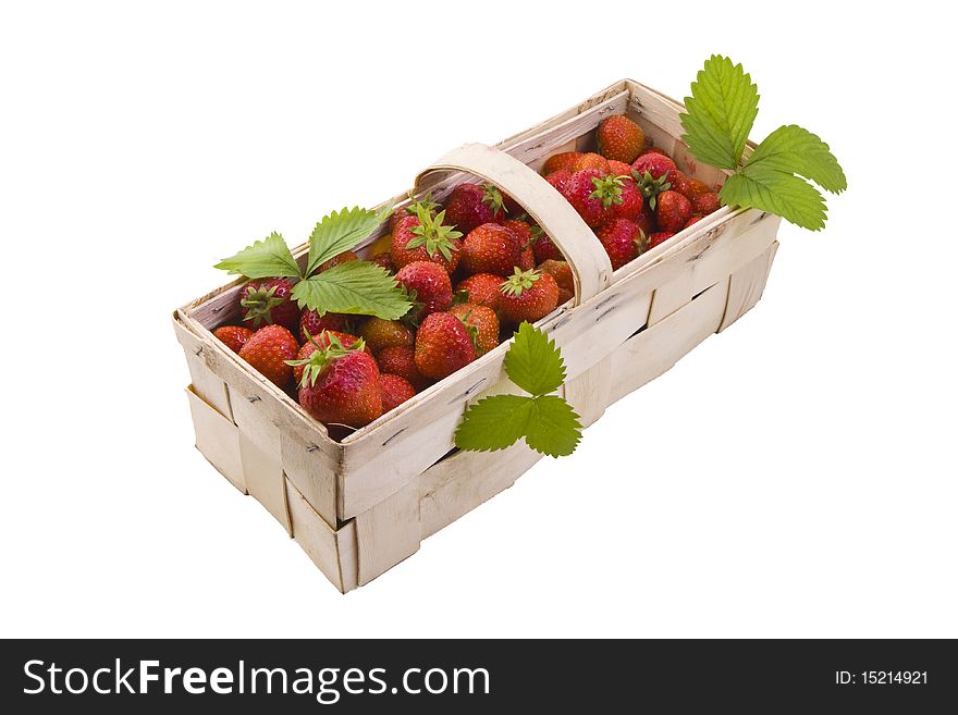 Fresh juicy strawberries in wooden basket isolated on white. Fresh juicy strawberries in wooden basket isolated on white