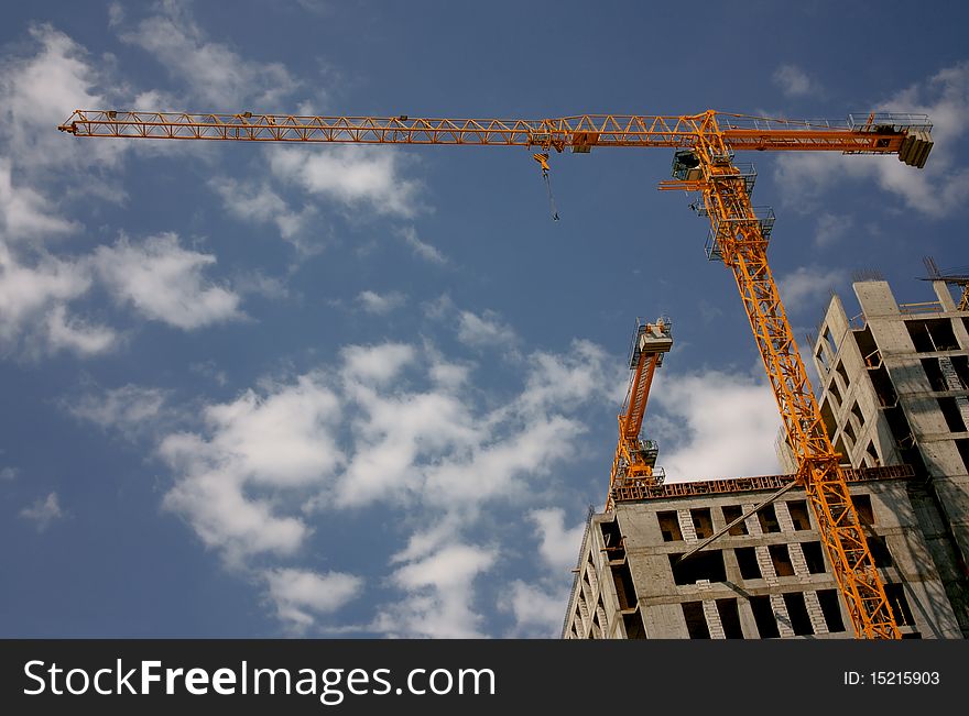 Crane at the blue sky with clouds. Crane at the blue sky with clouds