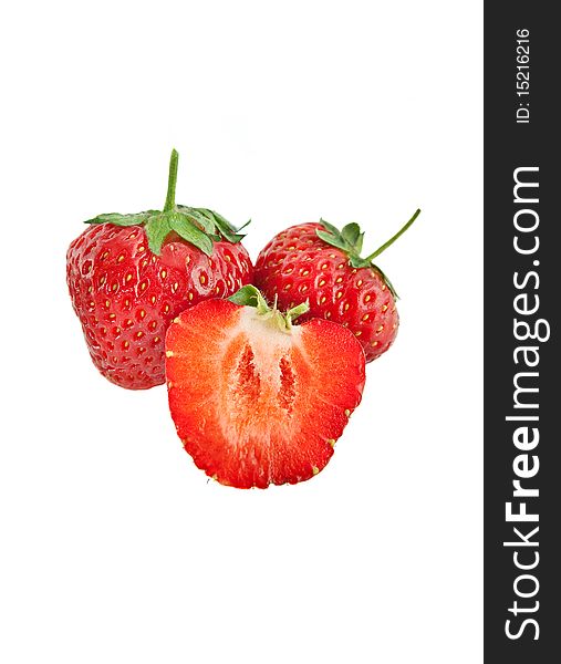 Three strawberries isolated on white background