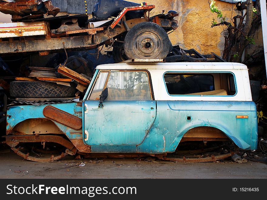 A view of an old abandoned and junked car. 1970's international scout jeep. A view of an old abandoned and junked car. 1970's international scout jeep.