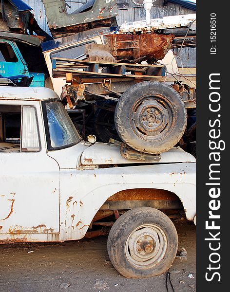 A view of an old abandoned and junked car. 1970's international scout jeep. A view of an old abandoned and junked car. 1970's international scout jeep.