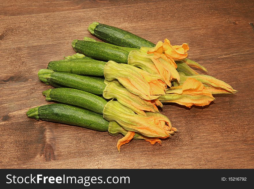 A group of zucchini with his flower. A group of zucchini with his flower