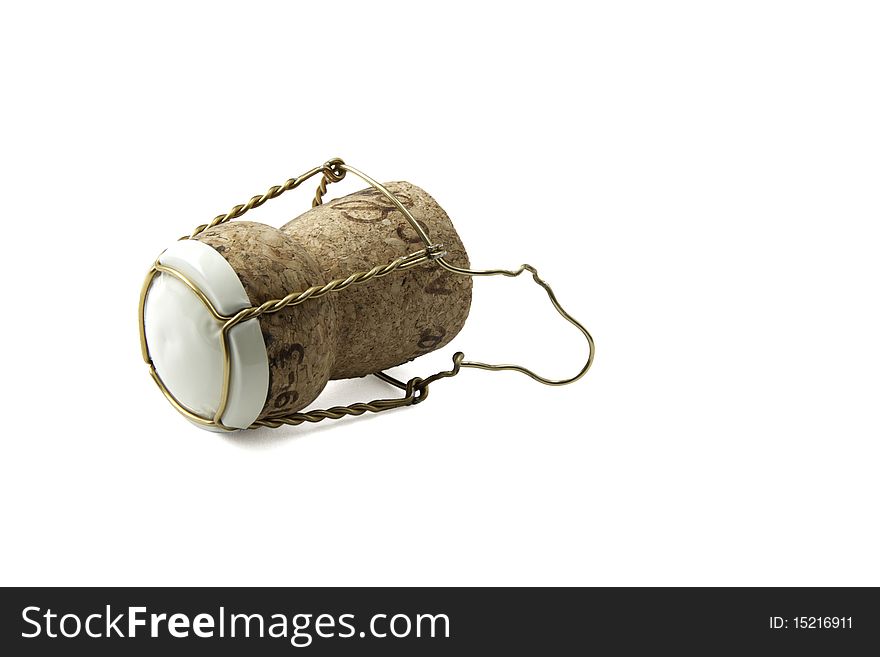 A used champagne cork studio isolated on a white background.  Contains an accurate clipping path of the cork and wire excluding the shadow.