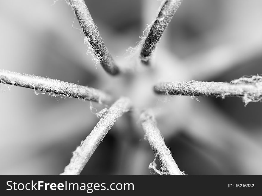 A macro of some very dusty wires split out into a star shape. Shallow DOF with focus on the nearest parts of the wires. A macro of some very dusty wires split out into a star shape. Shallow DOF with focus on the nearest parts of the wires.