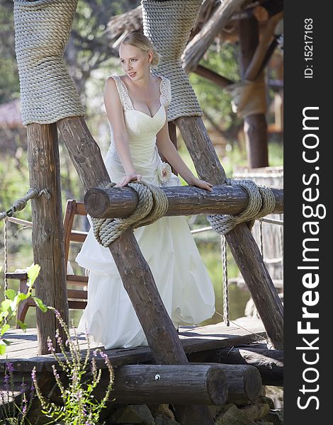 Bride on the wooden bridge