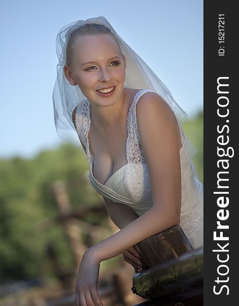 Portrait of happy young bride posing outdoor. Portrait of happy young bride posing outdoor