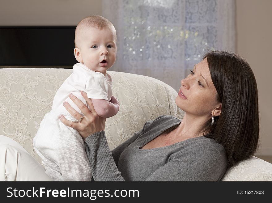 Horizontal image of a young mother and her baby. Horizontal image of a young mother and her baby