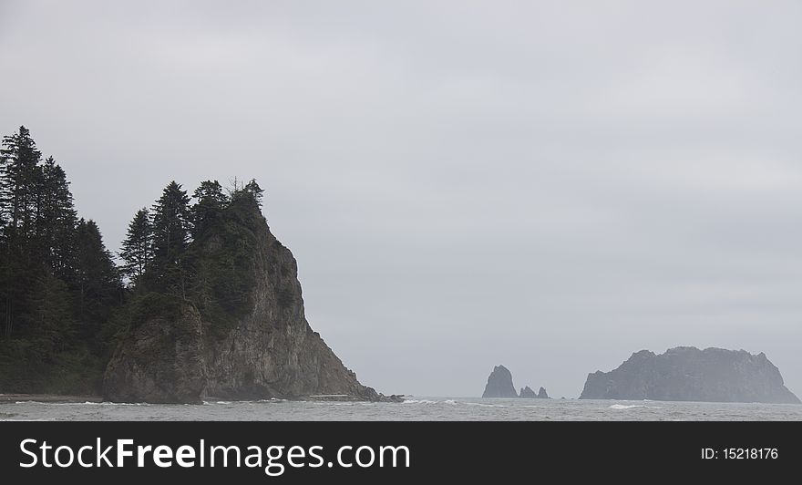 Cliffs and seastacks rising from the surf