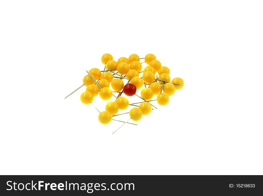 A red pin surrounded by a yellow pin isolated in white. A red pin surrounded by a yellow pin isolated in white