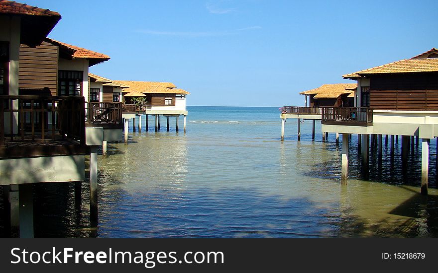 Image of water cabin with blue sea background