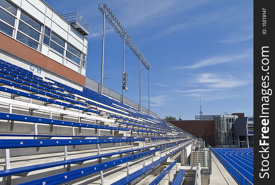 Grandstand seating in sports stadium, daytime. Grandstand seating in sports stadium, daytime