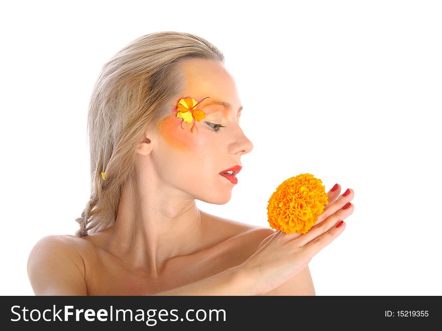 Surprised young woman with yellow flower isolated in white