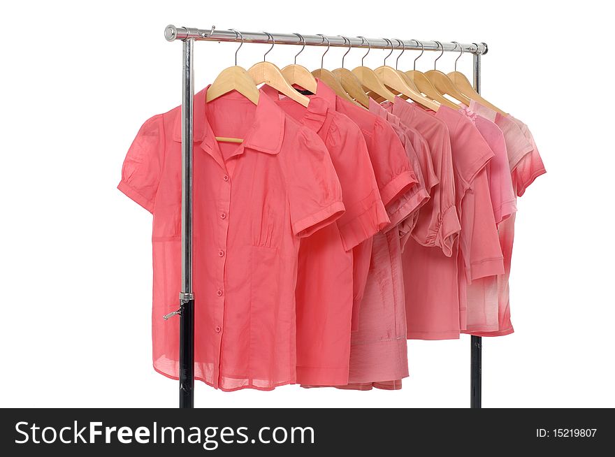 Fashion red shirts rack on white. Fashion red shirts rack on white