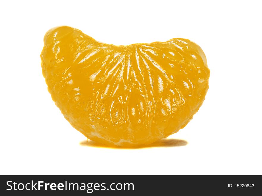 Completely cleared from peel one orange segment. Completely cleared from peel one orange segment