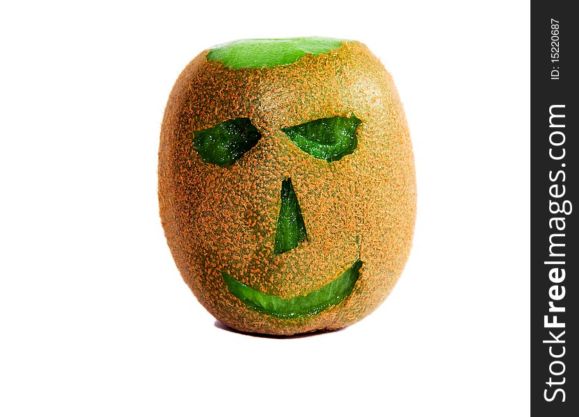 Head (eye, nose, mouth, bald head), cut out from the ripened fruit kiwi. Head (eye, nose, mouth, bald head), cut out from the ripened fruit kiwi