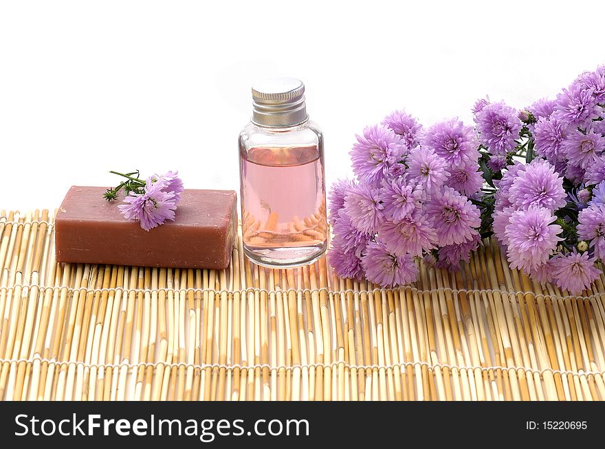 Spa bottles and daisies with soap. Spa bottles and daisies with soap