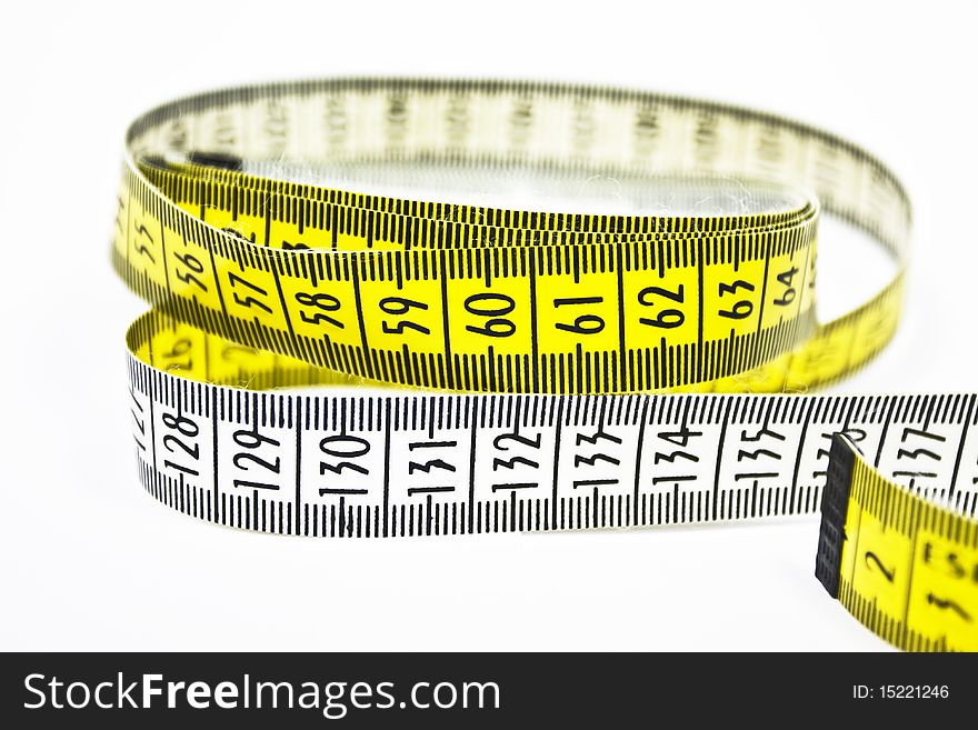 It is a yellow tape measure in a isolated background
