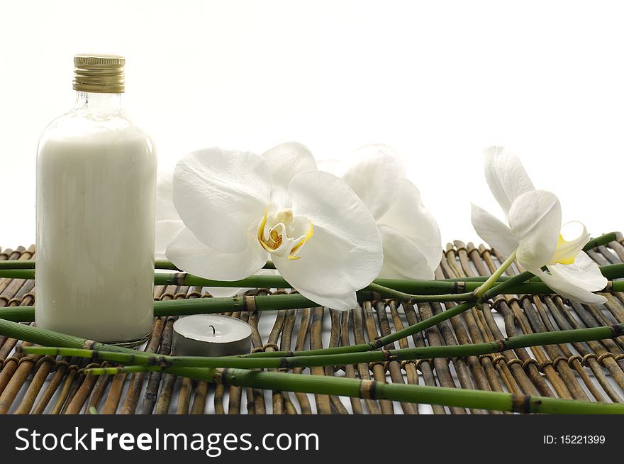 Body care items on bamboo mat background. Body care items on bamboo mat background