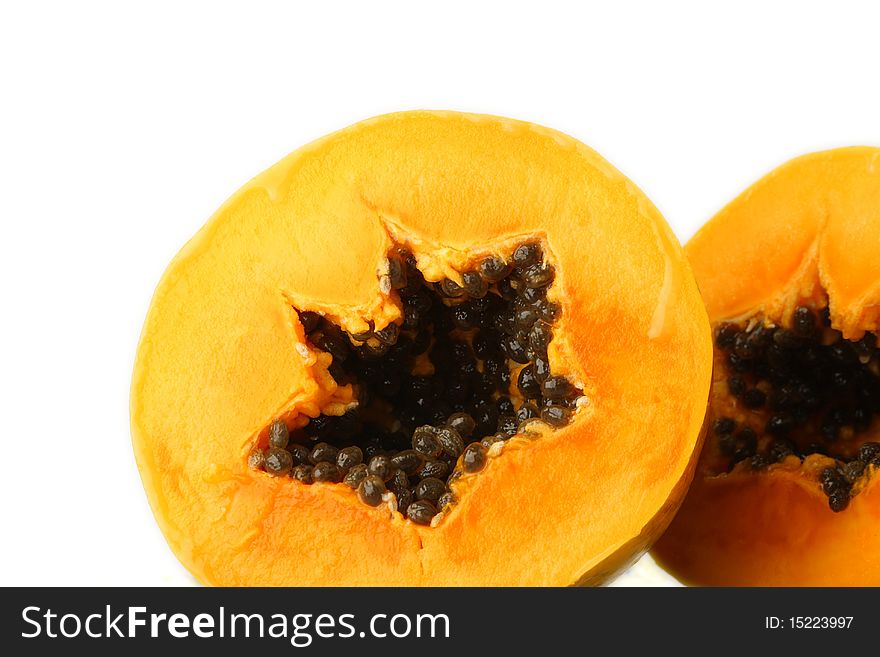 Two papaya slice on a white background. Two papaya slice on a white background