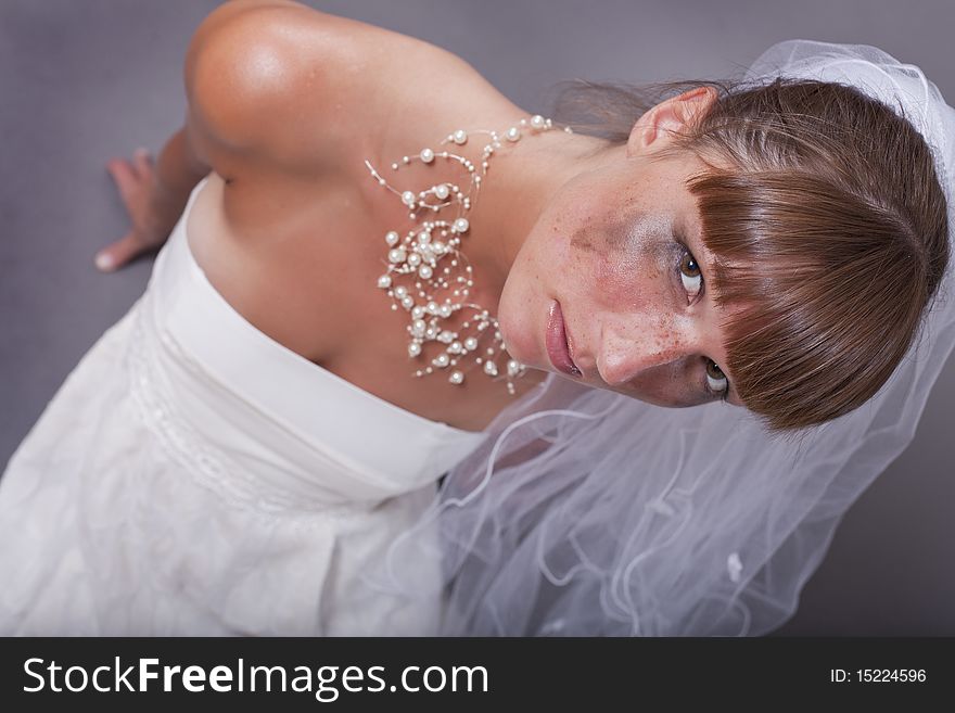 Crying and frustrated bride sitting on the ground. Crying and frustrated bride sitting on the ground