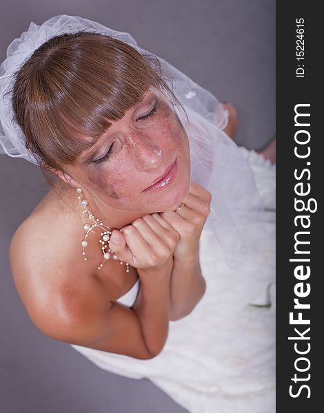 Sad bride crying