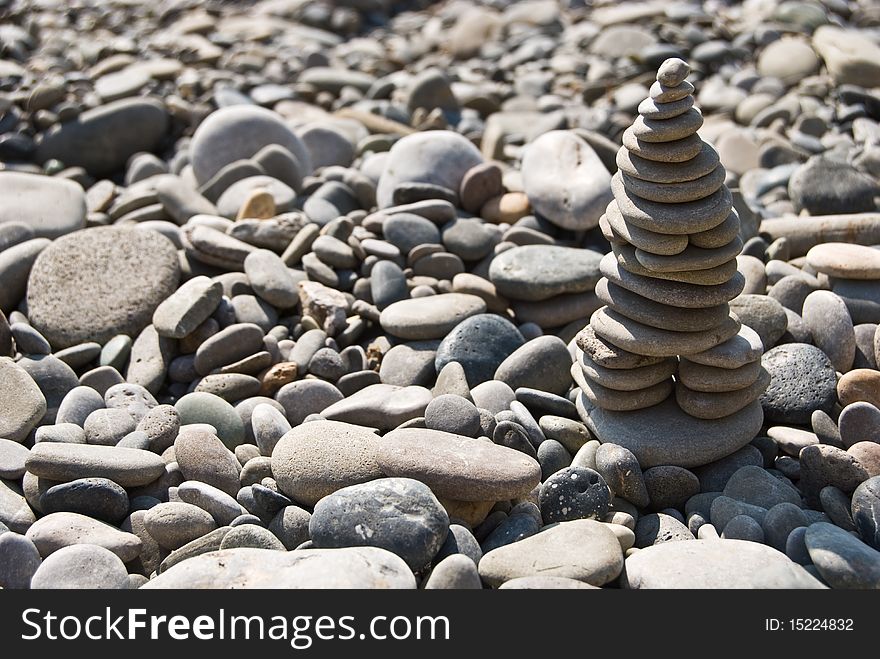 Stones, pebbles combined in a pyramid, zen. Stones, pebbles combined in a pyramid, zen