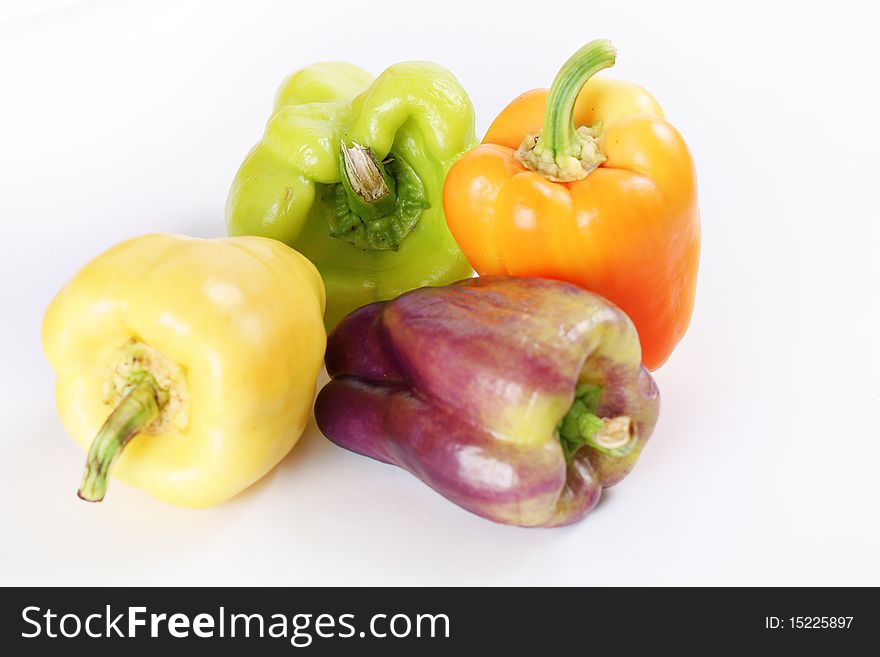 Assorted Colorful Peppers On White