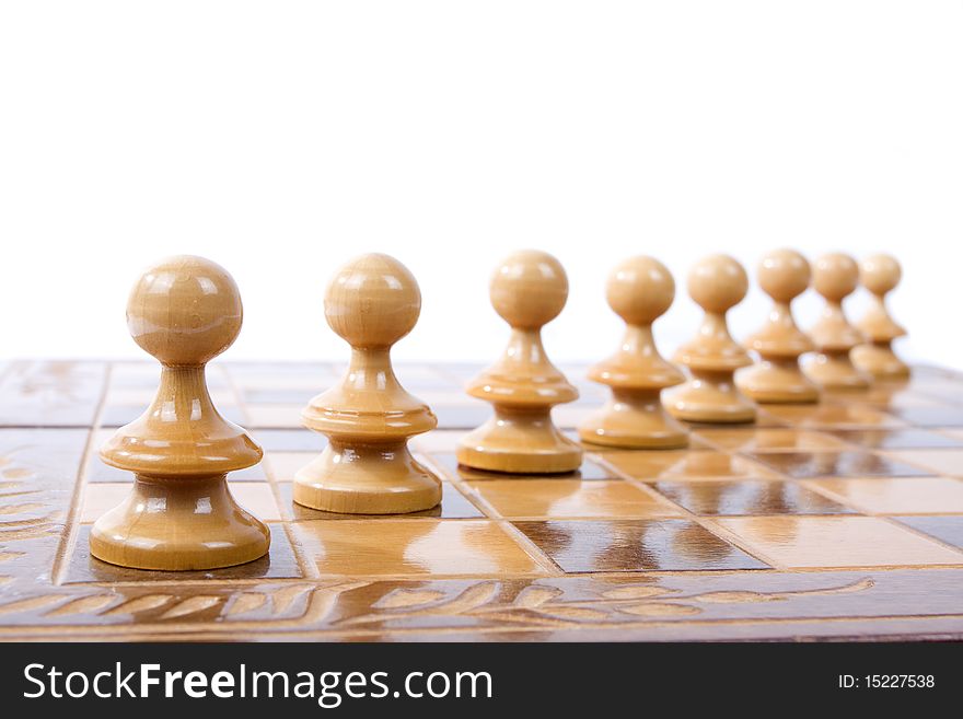 Diagonal chess figures on a chessboard isolated on white background