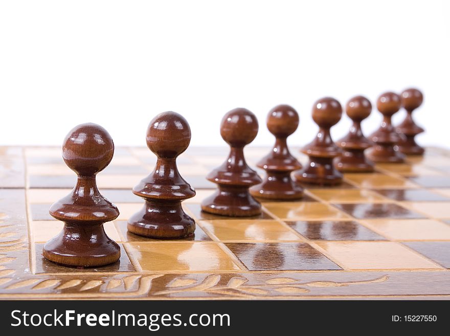 Diagonal black chess figures on a chessboard isolated on white background