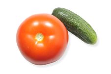 Ripe Tomato And A Cucumber Isolated On White Royalty Free Stock Photography