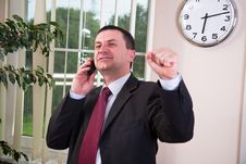Businessman Talking On The Phone Stock Photos