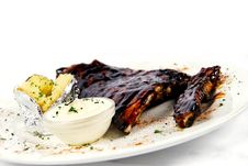 Pork Ribs With A Baked Potato And Sour Cream Royalty Free Stock Image Pork Ribs With A Baked Potato And Sour Cream Royalty Free Stock Image