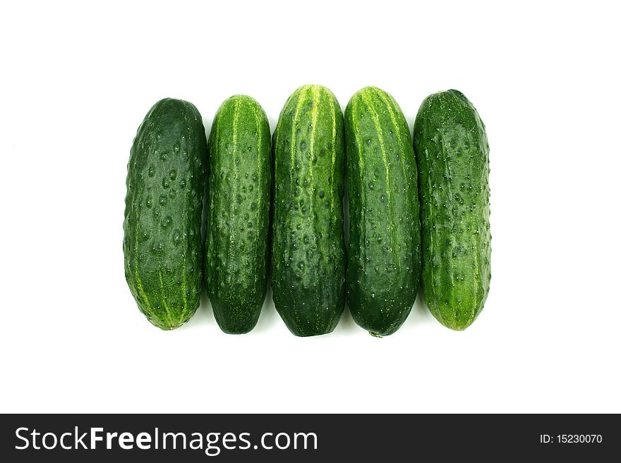 Series of five cucumber on the white background