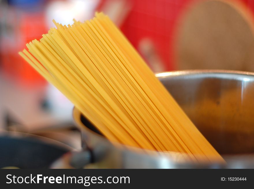 Spaghetti pasta placed in a silver pot. Spaghetti pasta placed in a silver pot