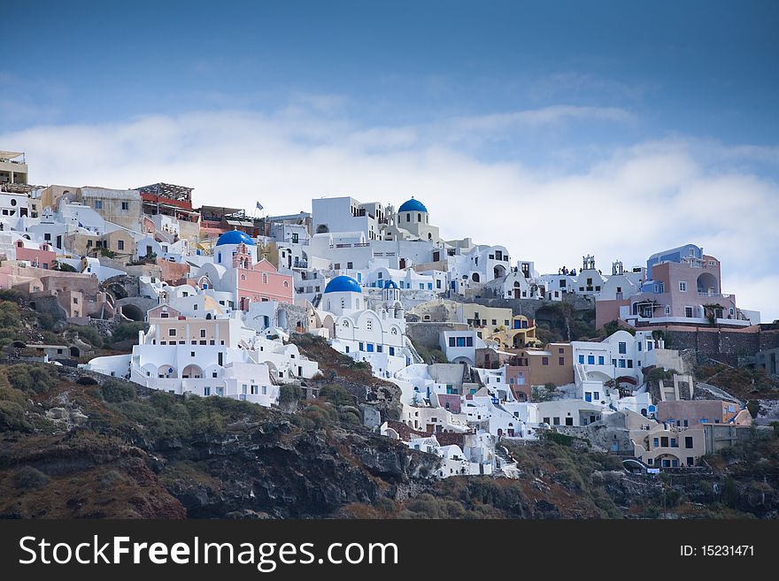 Santorini sky line with the classic blue and white building on show