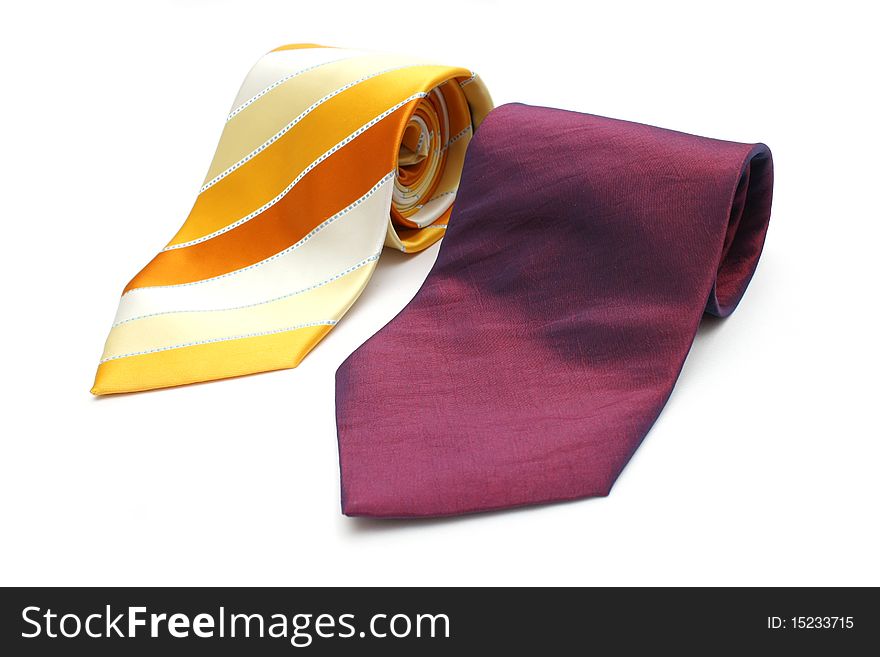 Two rolled up necktie isolated on white background.