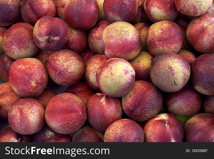 Fresh ripe nectarines sold at the organic farmers market