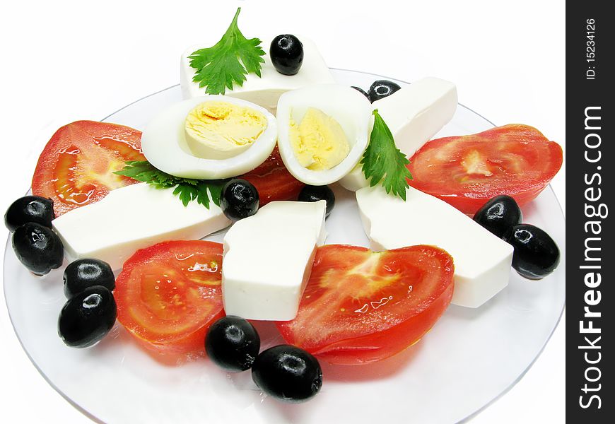 Mediterranean breakfast made of tomato cheese egg and olive