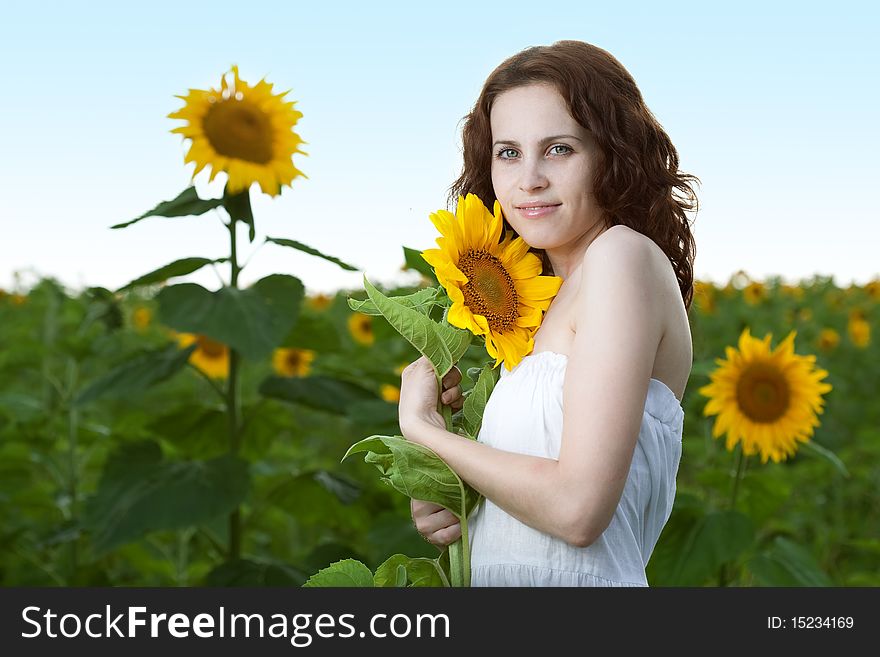 Young beauty woman on sea under sky