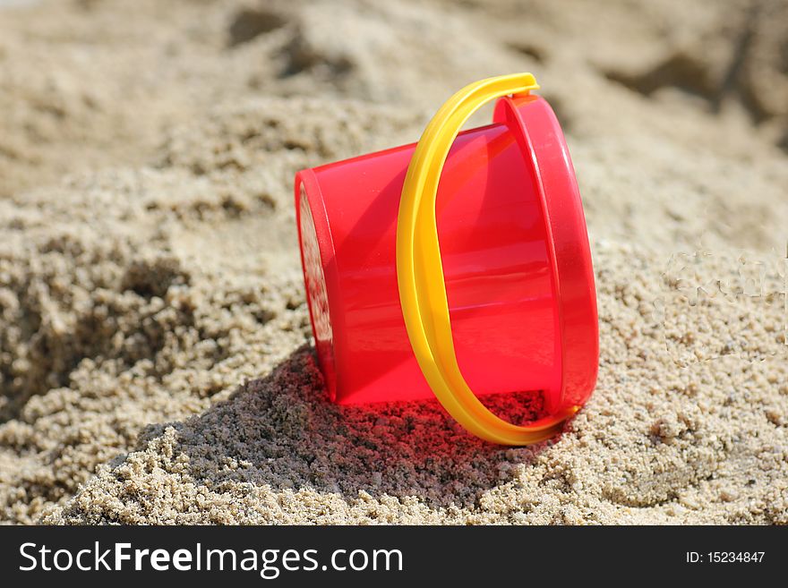 Toys left lying in the sand