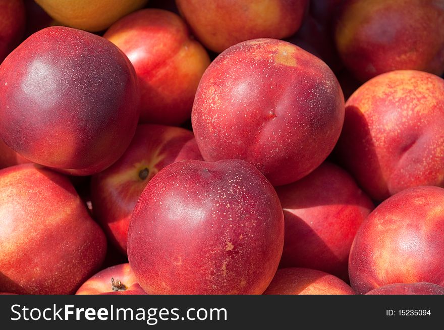 Background of ripe, juicy peach red
