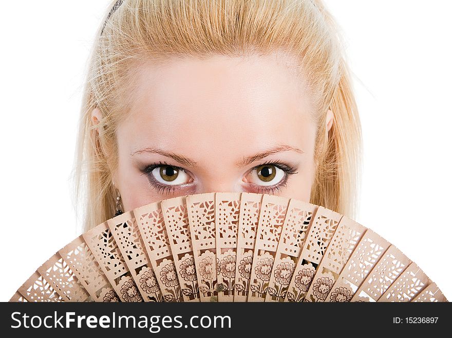 Young beautiful blond girl with a fan