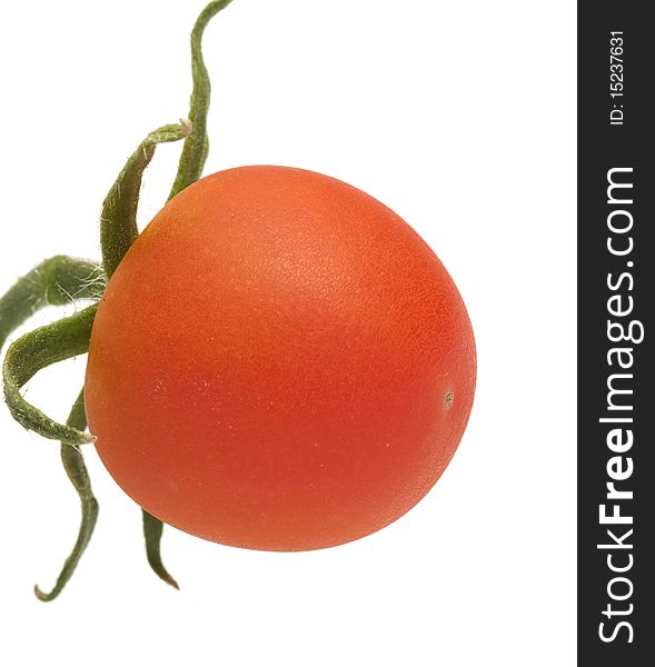 Red tomato close up it is isolated on a white background. Red tomato close up it is isolated on a white background.