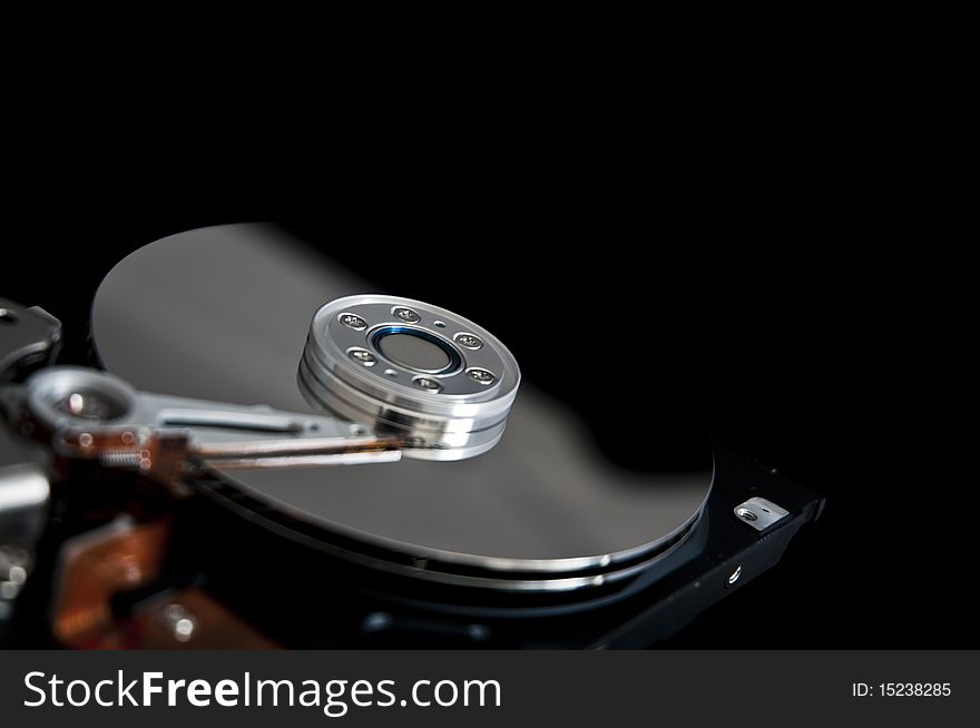 Open hard disk drive closeup. Open hard disk drive closeup