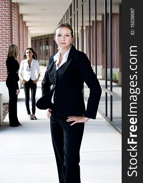 Attractive businesswoman looking at camera
