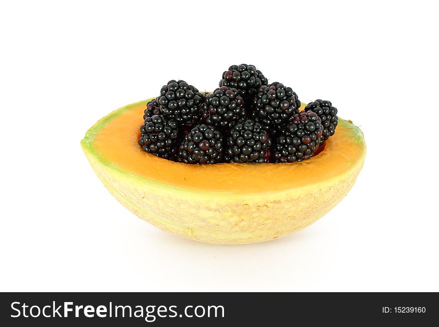 Blackberries in melon