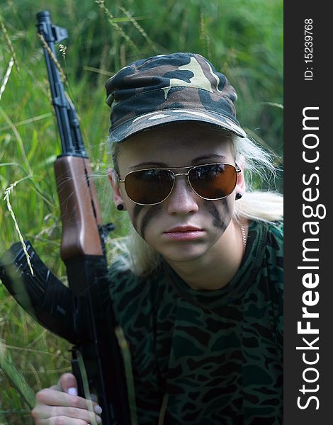 Blonde In Spectacles With Weapon